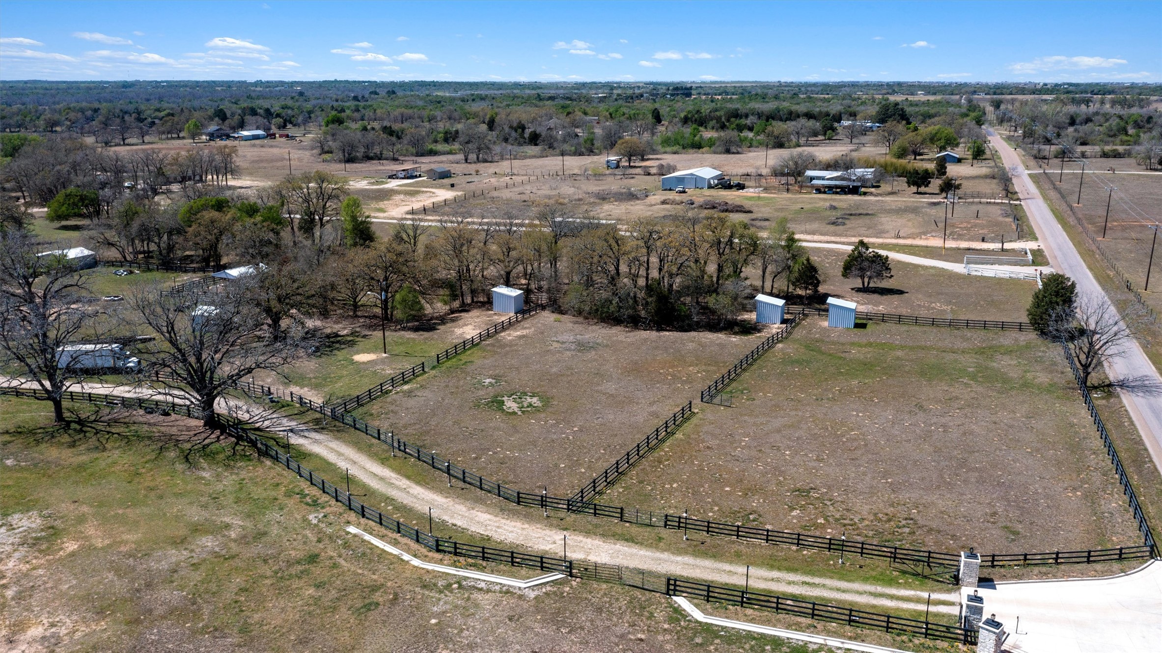 359 North County Line Road Elgin, TX 78621 - Photo 8 of 24 a view of a swimming pool with a yard and mountain view