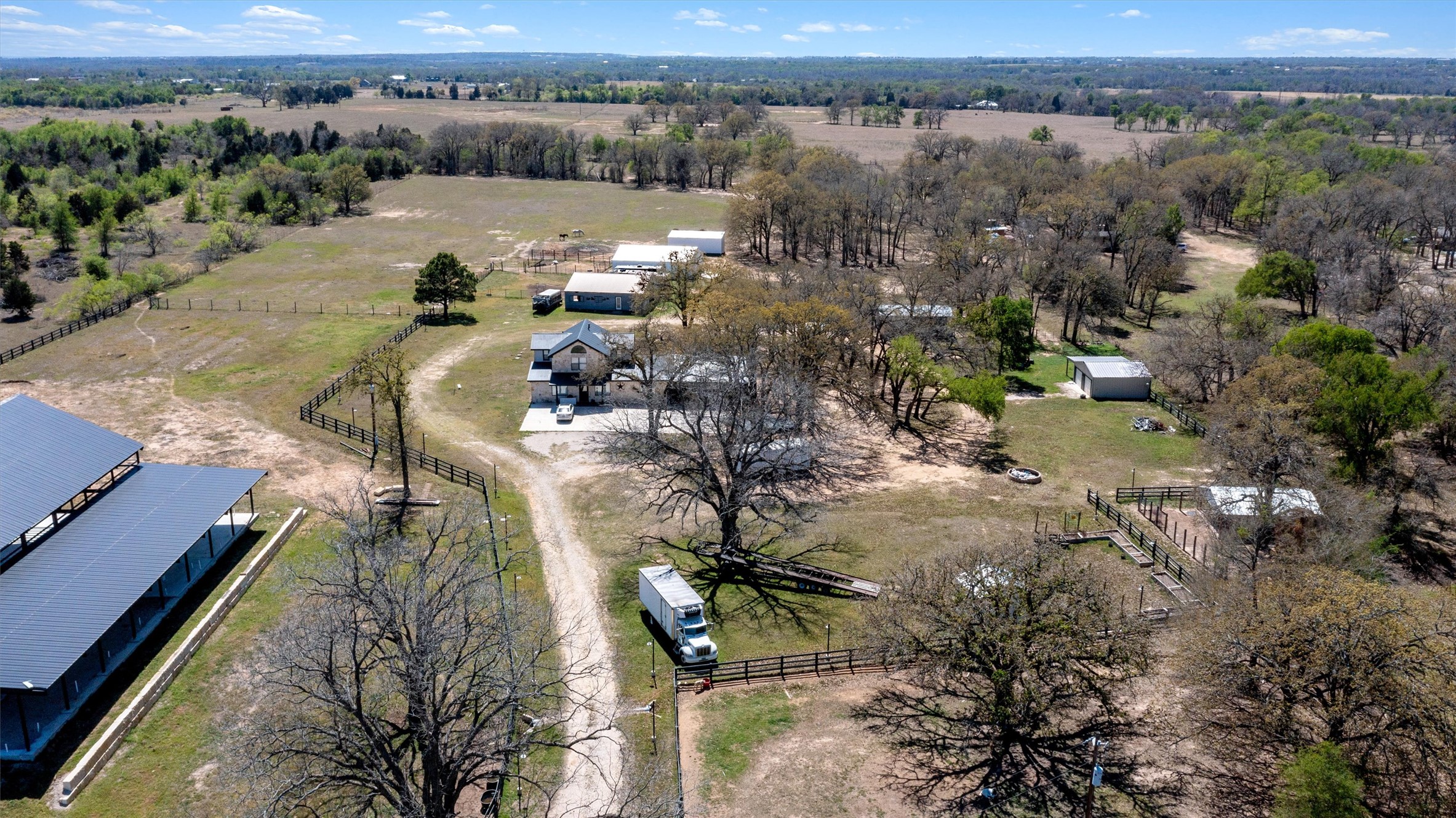 359 North County Line Road Elgin, TX 78621 - Photo 9 of 24 an aerial view of a house with a yard