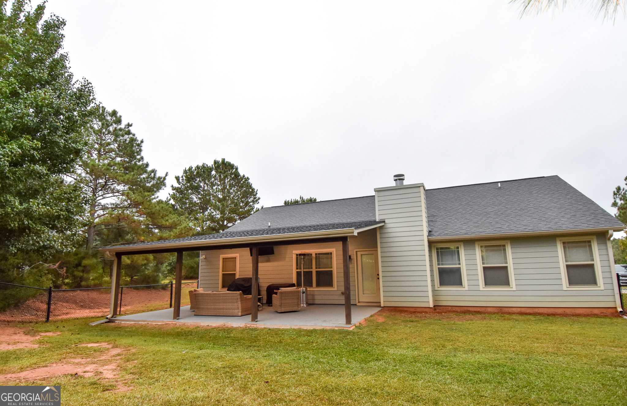 1946 Highway 362 Williamson, GA 30292 - Photo 103 of 104 a backyard of a house with garden barbeque oven and outdoor seating