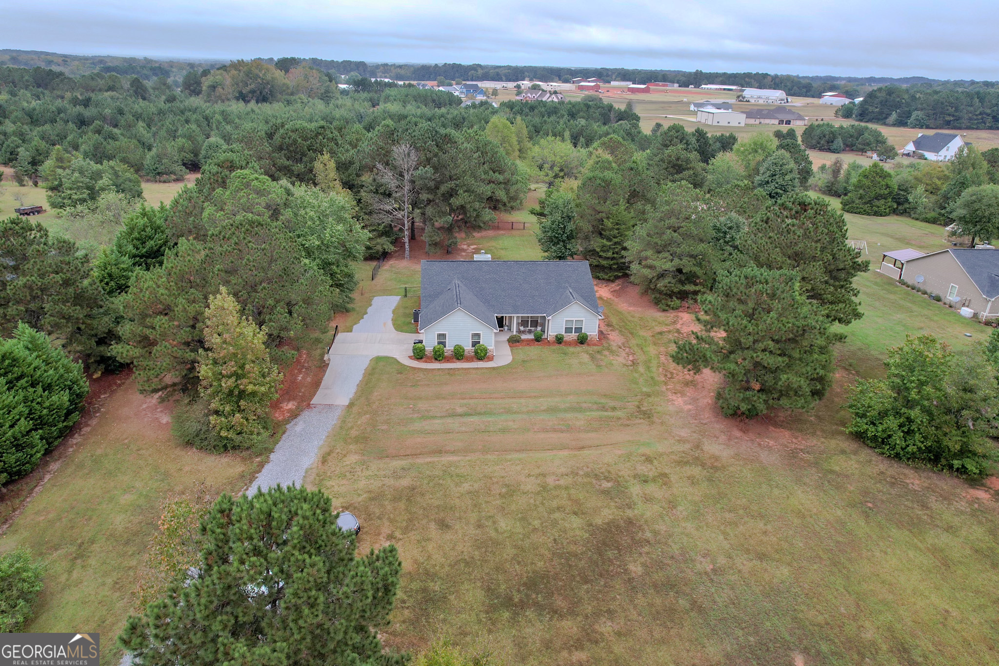 1946 Highway 362 Williamson, GA 30292 - Photo 3 of 104 an aerial view of a house with a yard