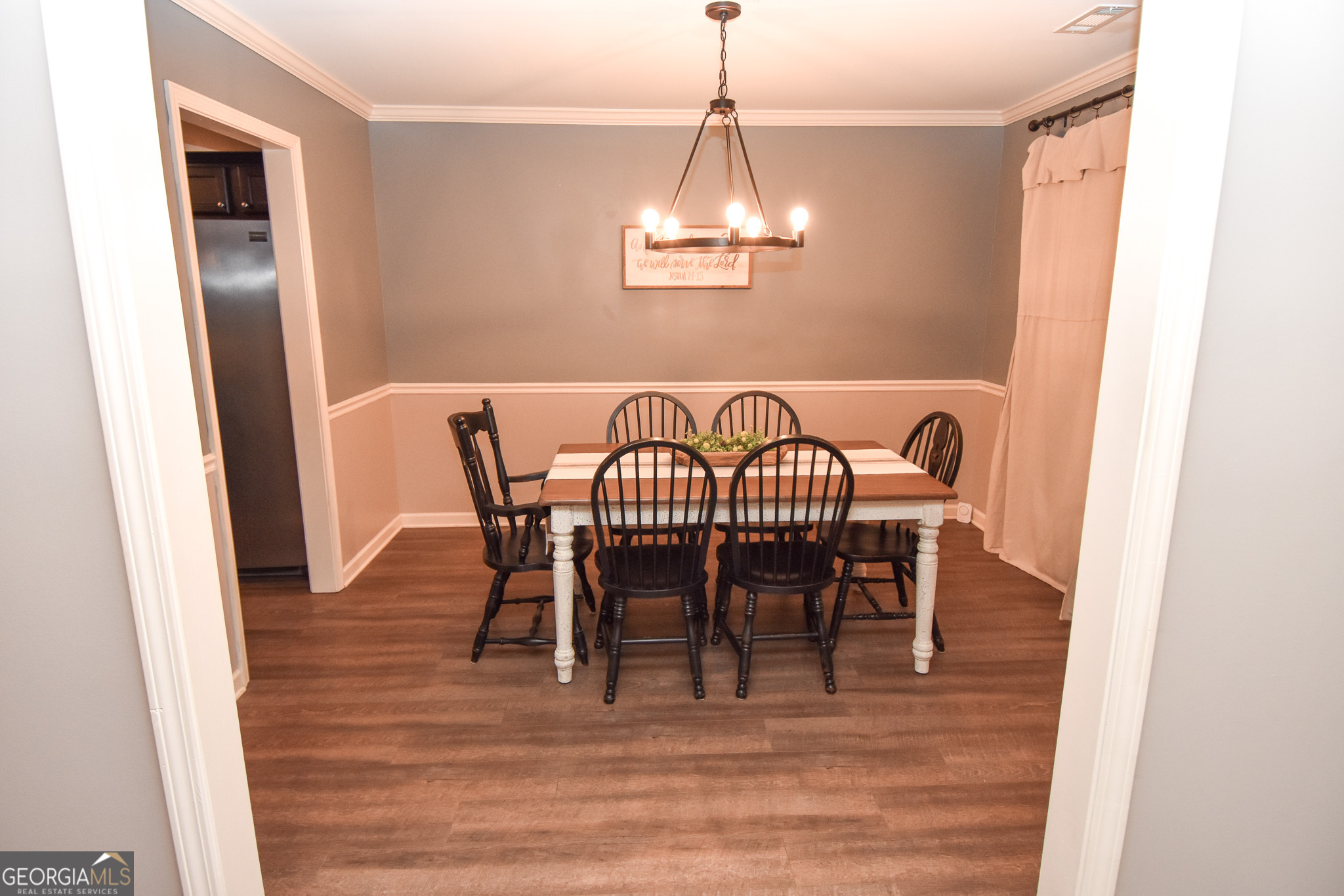 1946 Highway 362 Williamson, GA 30292 - Photo 31 of 104 a view of a dining room with furniture wooden floor and chandelier