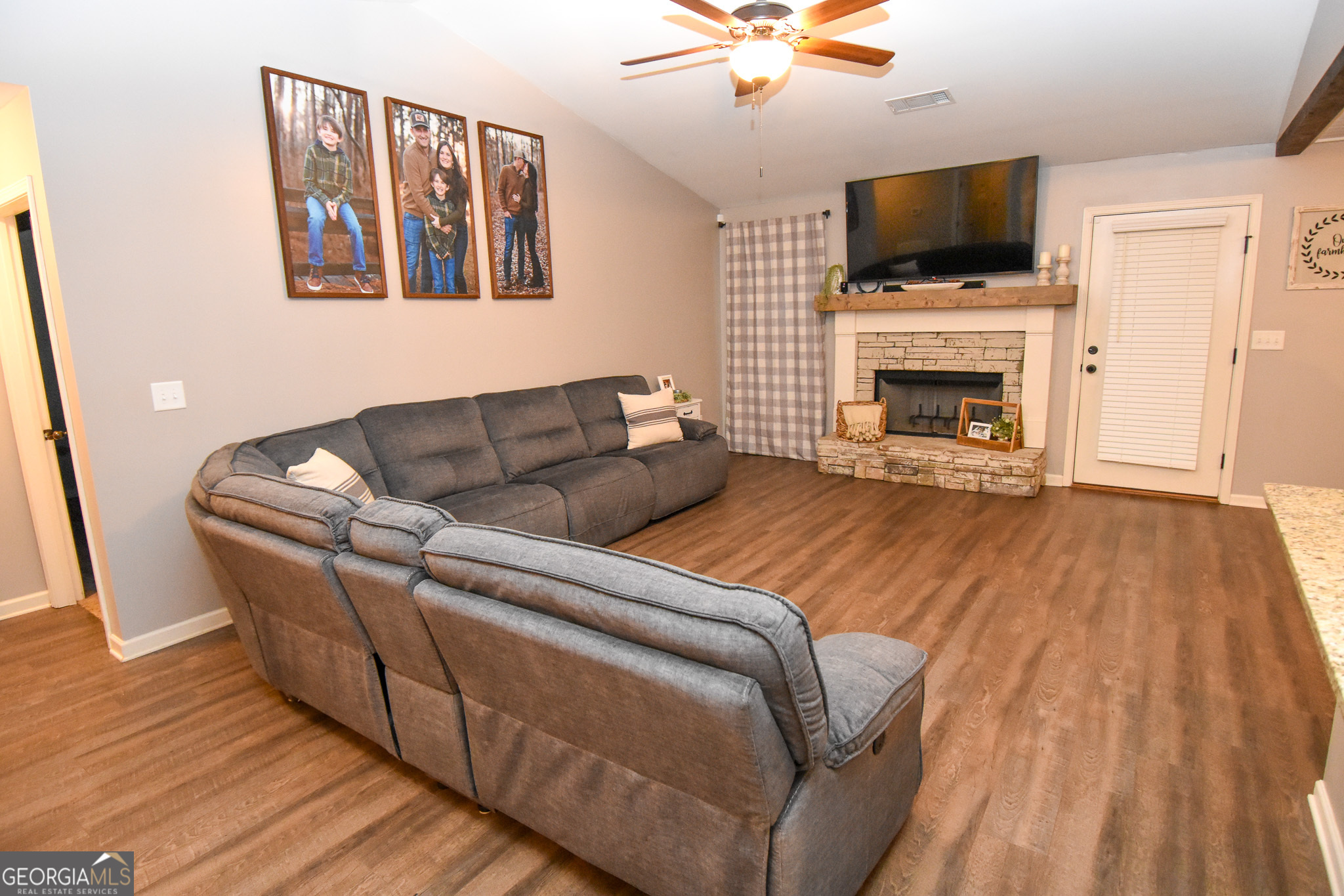 1946 Highway 362 Williamson, GA 30292 - Photo 35 of 104 a living room with furniture fireplace and flat screen tv