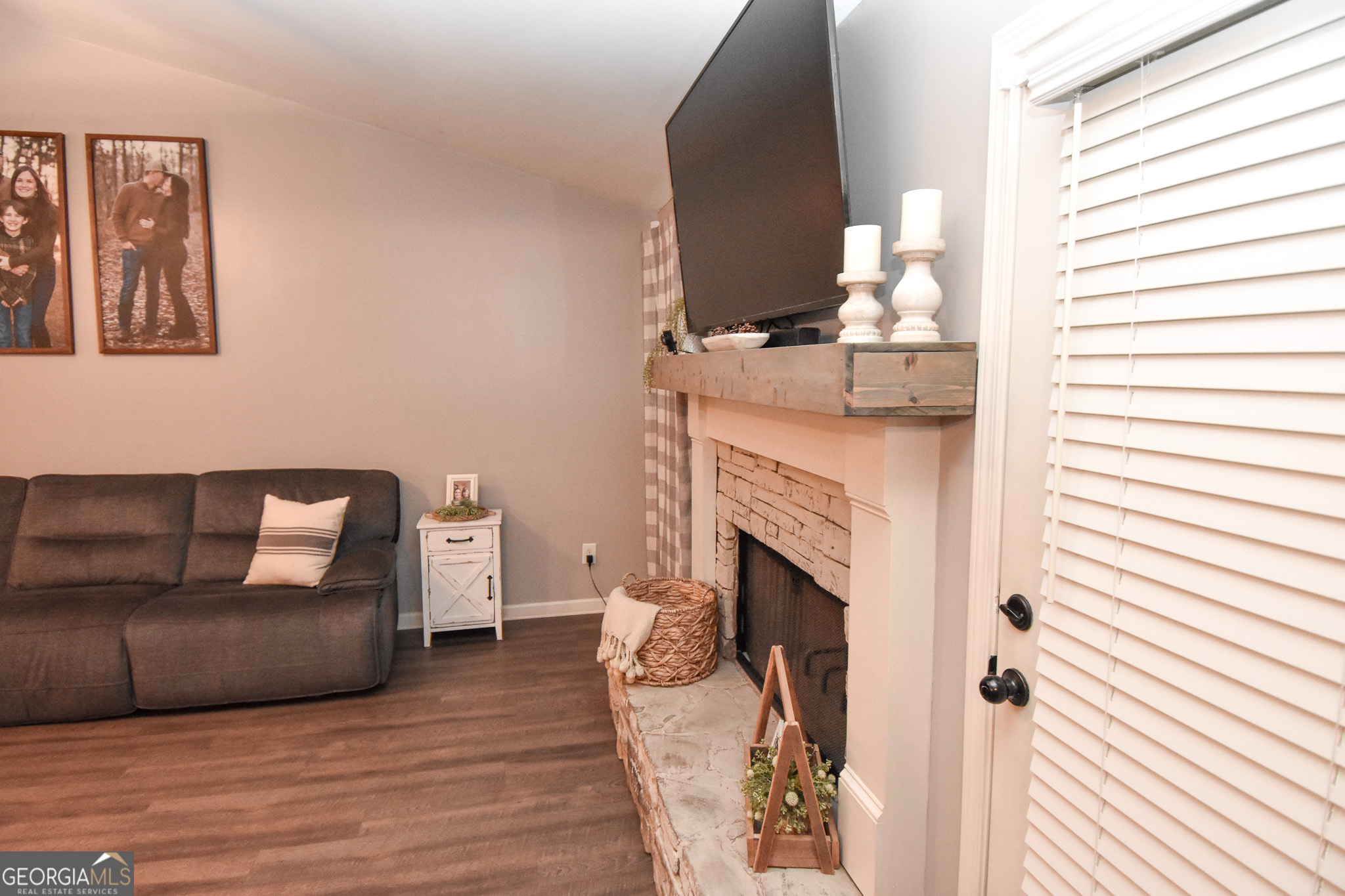 1946 Highway 362 Williamson, GA 30292 - Photo 42 of 104 a living room with furniture and a fireplace