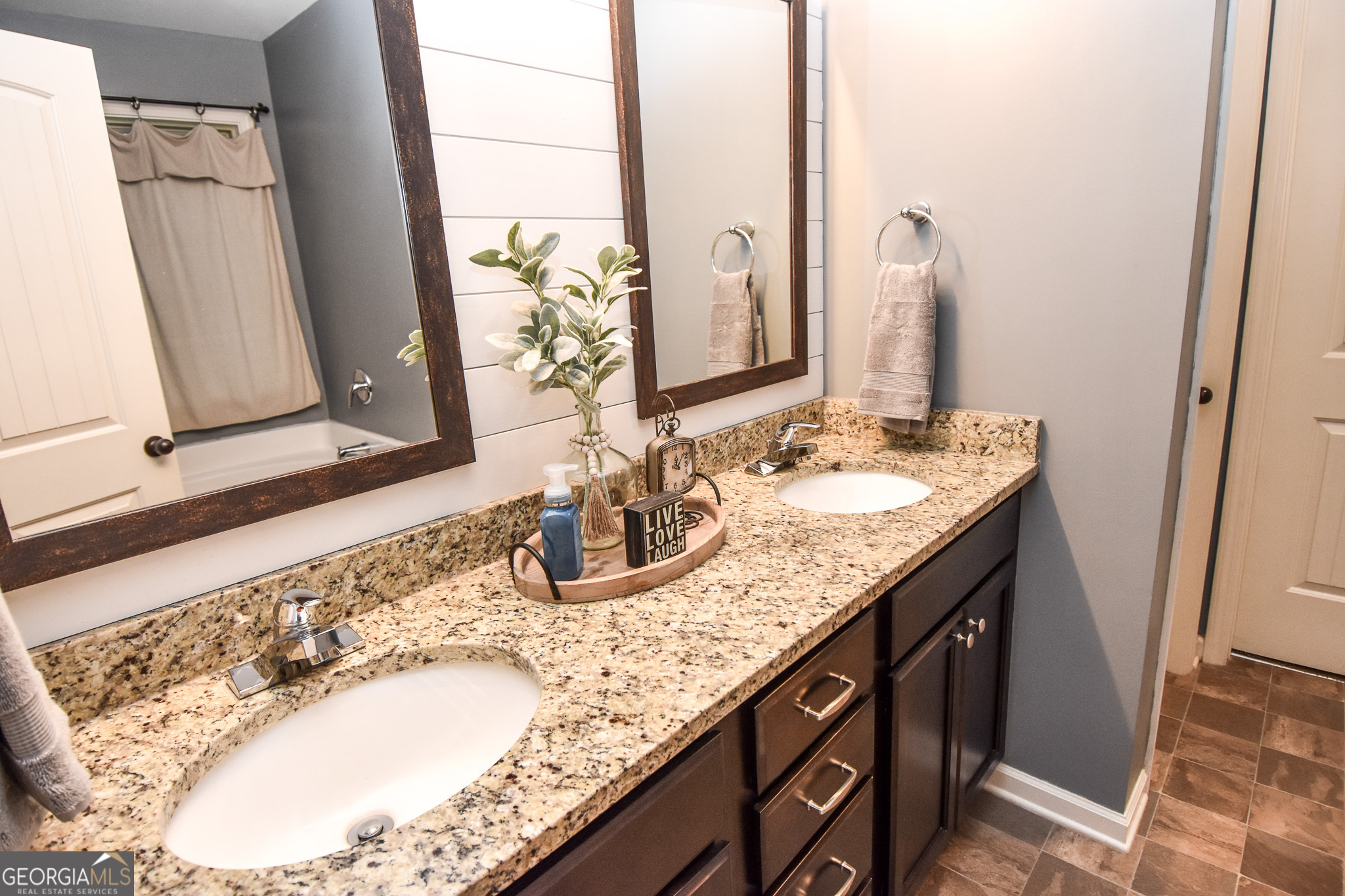 1946 Highway 362 Williamson, GA 30292 - Photo 62 of 104 a bathroom with a granite countertop sink and a mirror