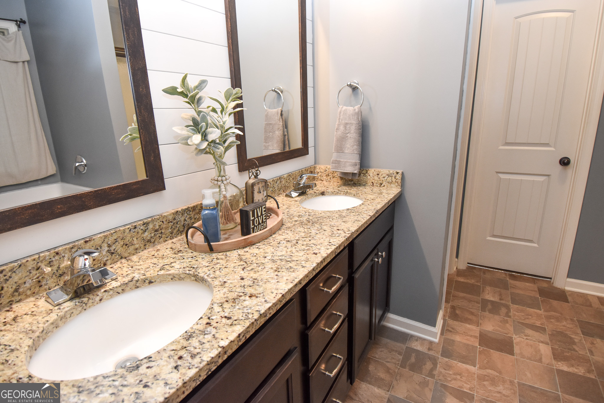 1946 Highway 362 Williamson, GA 30292 - Photo 70 of 104 a bathroom with a granite countertop sink and a mirror