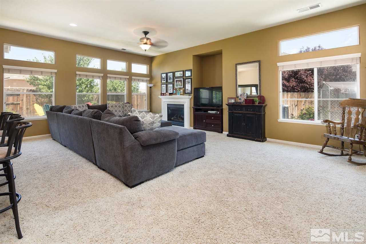 1655 Sewell Drive Reno, NV 89521 - Photo 3 of 21 a living room with furniture and large windows