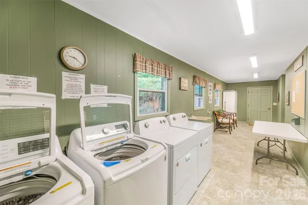 a room with furniture a bed and a window