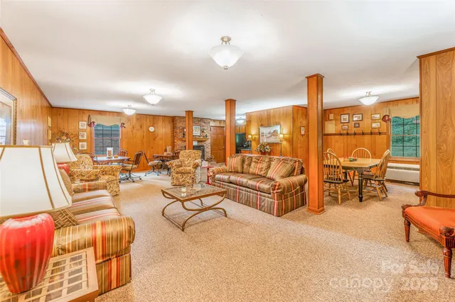a living room with furniture and a view of living room