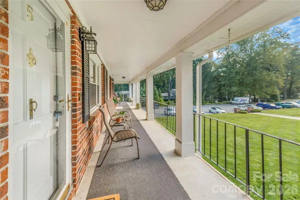 a view of swimming pool from a balcony