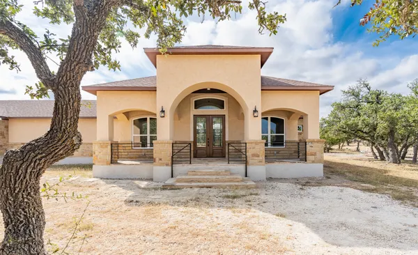 a view of entrance gate of a house