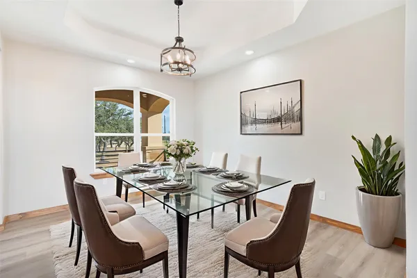 a view of a dining room with furniture window and outside view