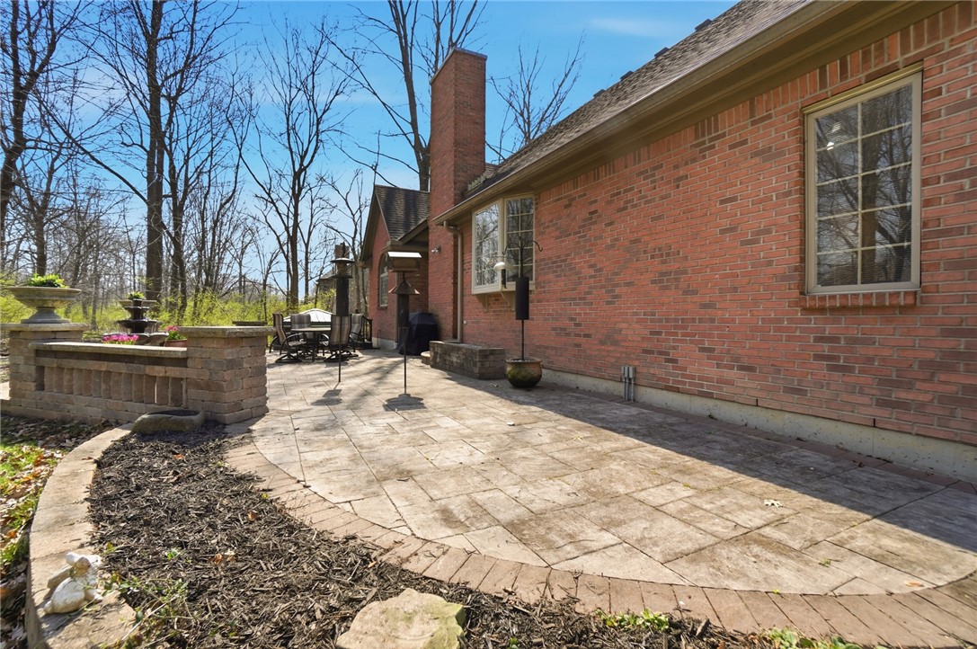 472 Timber Walk Court Springboro, OH 45066 - Photo 70 of 86 Enjoy outdoor living on this expansive brick patio, perfect for entertaining.