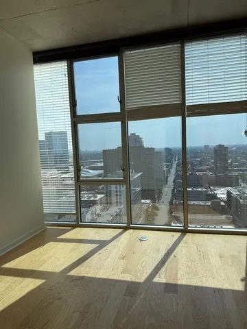 a view of a swimming pool with a balcony