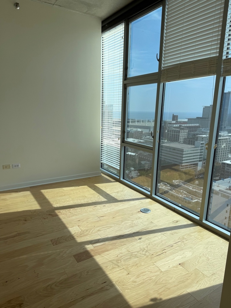 1720 South Michigan Avenue, Unit 2609 Chicago, IL 60616 - Photo 5 of 16 a room with a balcony and ocean view