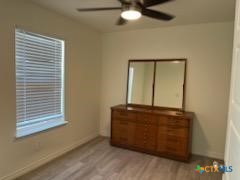 907 East 3rd Street, Unit A Lampasas, TX 76550 - Photo 5 of 13 a view of a hallway with entryway