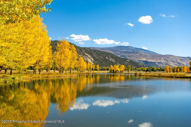 a view of a lake with a mountain