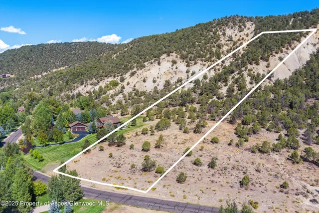 a view of a large body of water and mountain