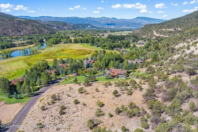 a view of a backyard with a garden