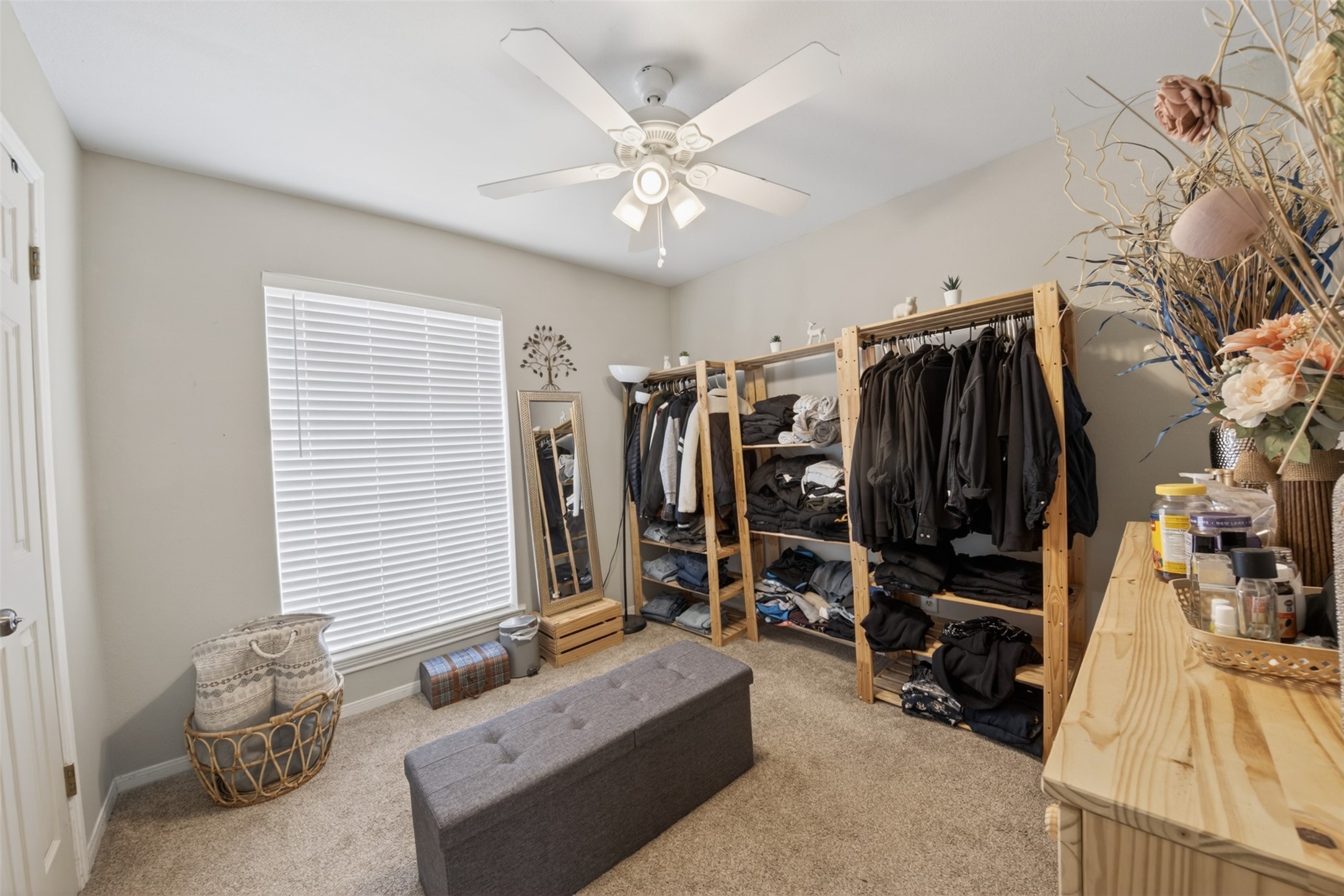8029 Tareyton Lane Houston, TX 77075 - Photo 12 of 20 a view of walk in closet with clothes and shoes