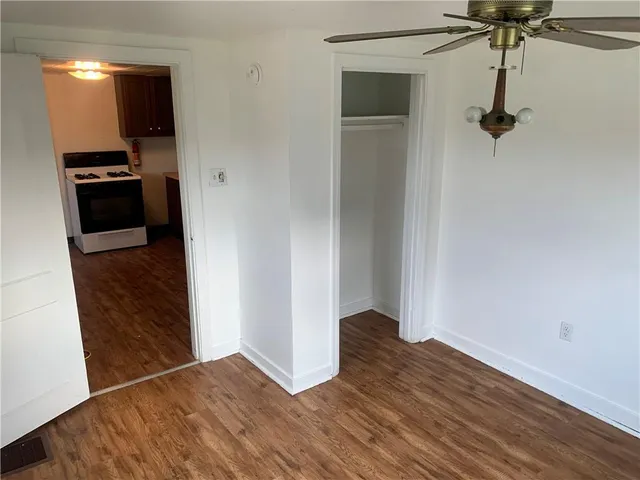a view of a kitchen from the hallway
