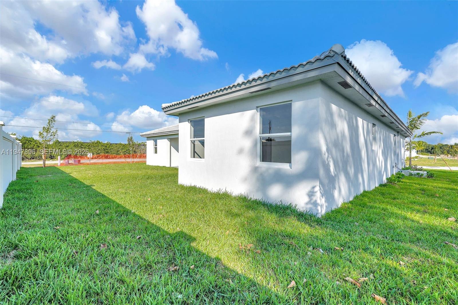 27210 Southwest 159th Path Homestead, FL 33031 - Photo 15 of 100 a view of an house with backyard space and garden
