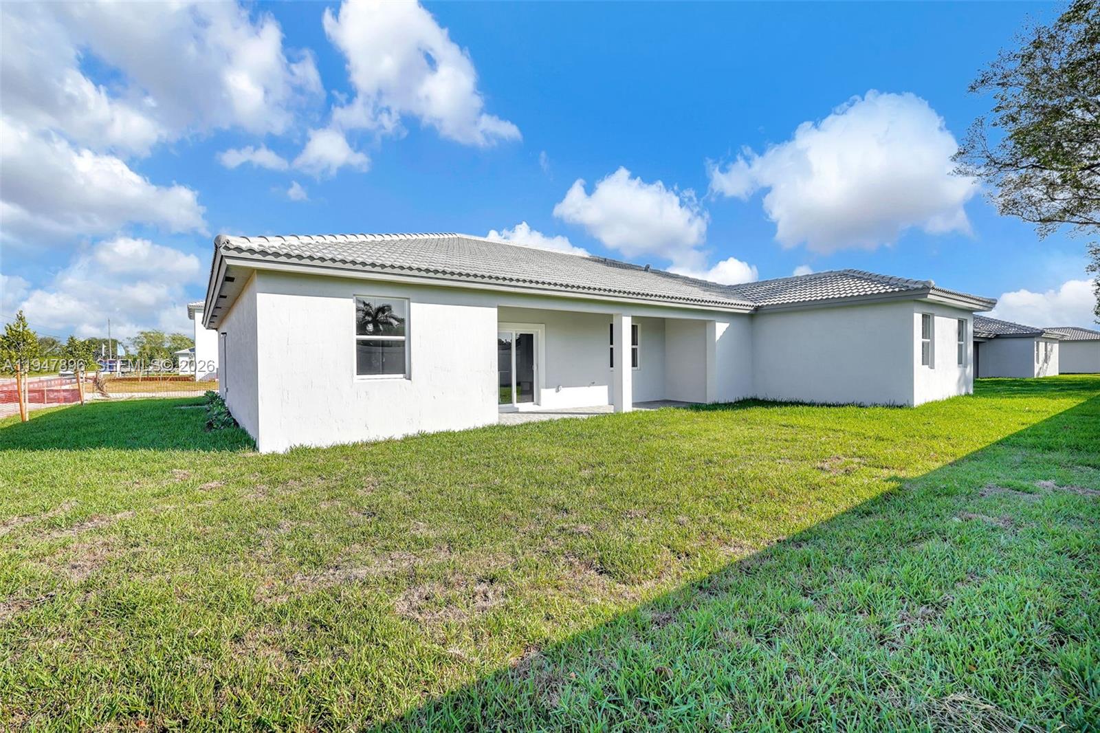 27210 Southwest 159th Path Homestead, FL 33031 - Photo 24 of 100 a view of a house with backyard and garden