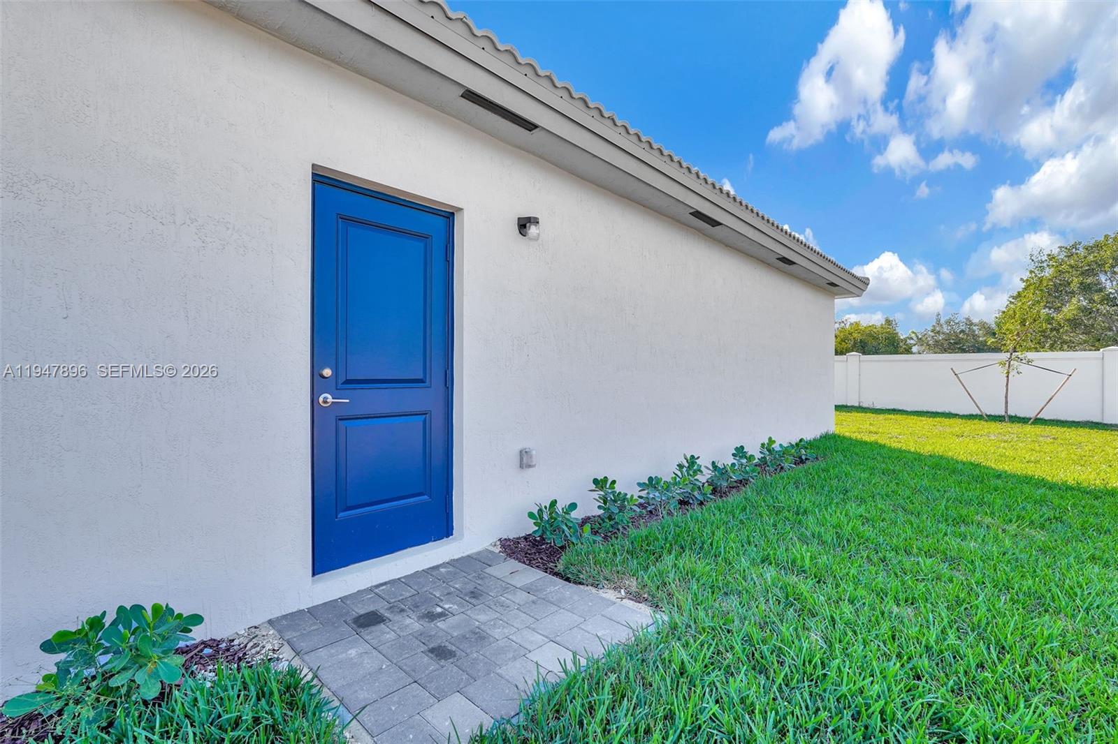 27210 Southwest 159th Path Homestead, FL 33031 - Photo 25 of 100 a view of backyard with garden