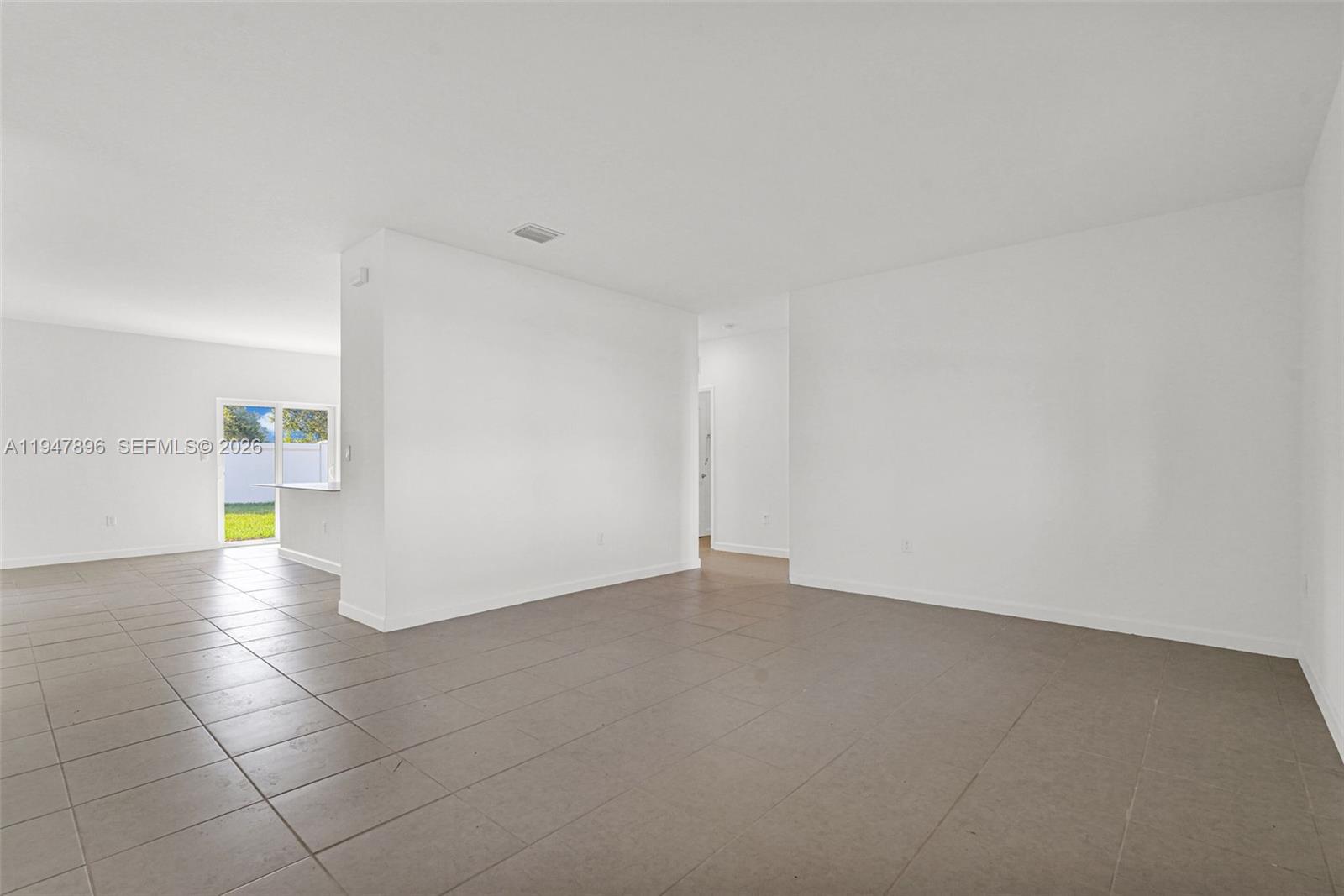 27210 Southwest 159th Path Homestead, FL 33031 - Photo 49 of 100 a view of an empty room