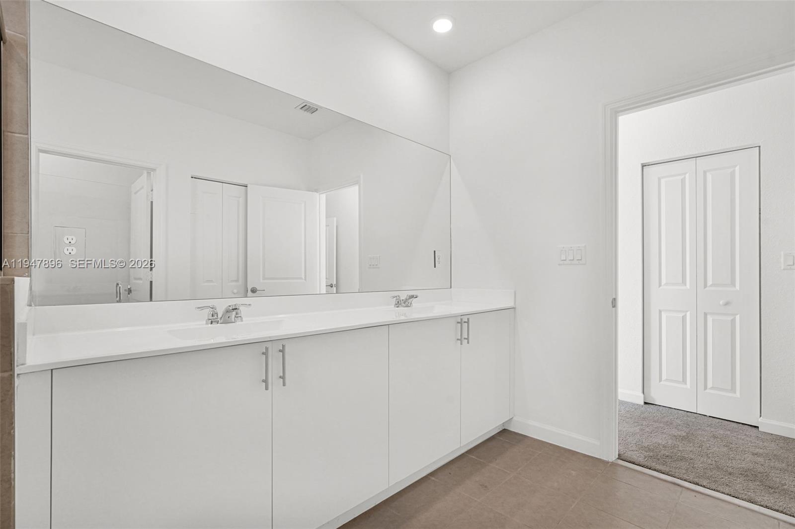 27210 Southwest 159th Path Homestead, FL 33031 - Photo 70 of 100 a view of a sink and cabinets in a room