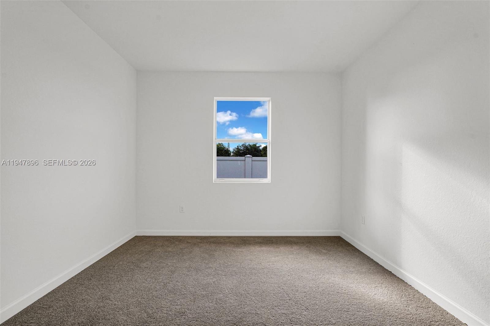 27210 Southwest 159th Path Homestead, FL 33031 - Photo 87 of 100 a view of an empty room