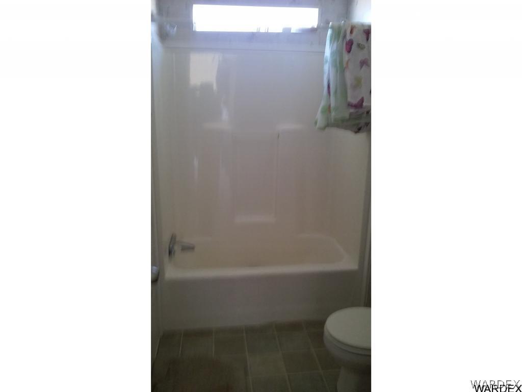 354 South Hope Road Golden Valley, AZ 86413 - Photo 5 of 12 a bathroom with a shower