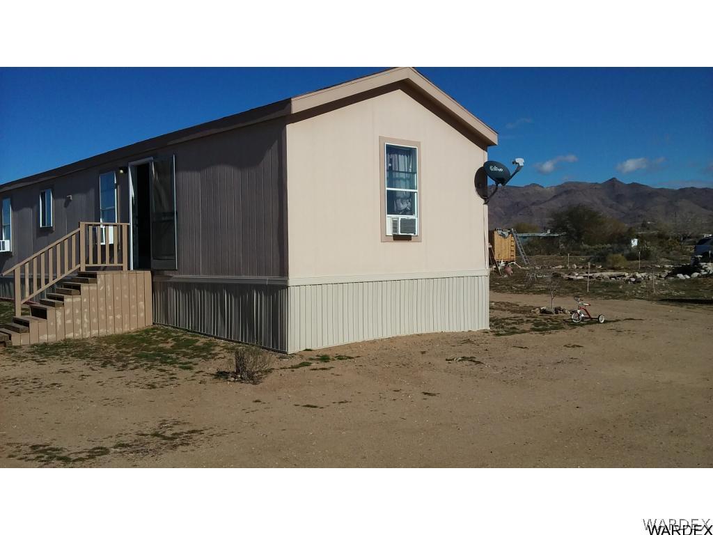 354 South Hope Road Golden Valley, AZ 86413 - Photo 10 of 12 a black and white photo of a house