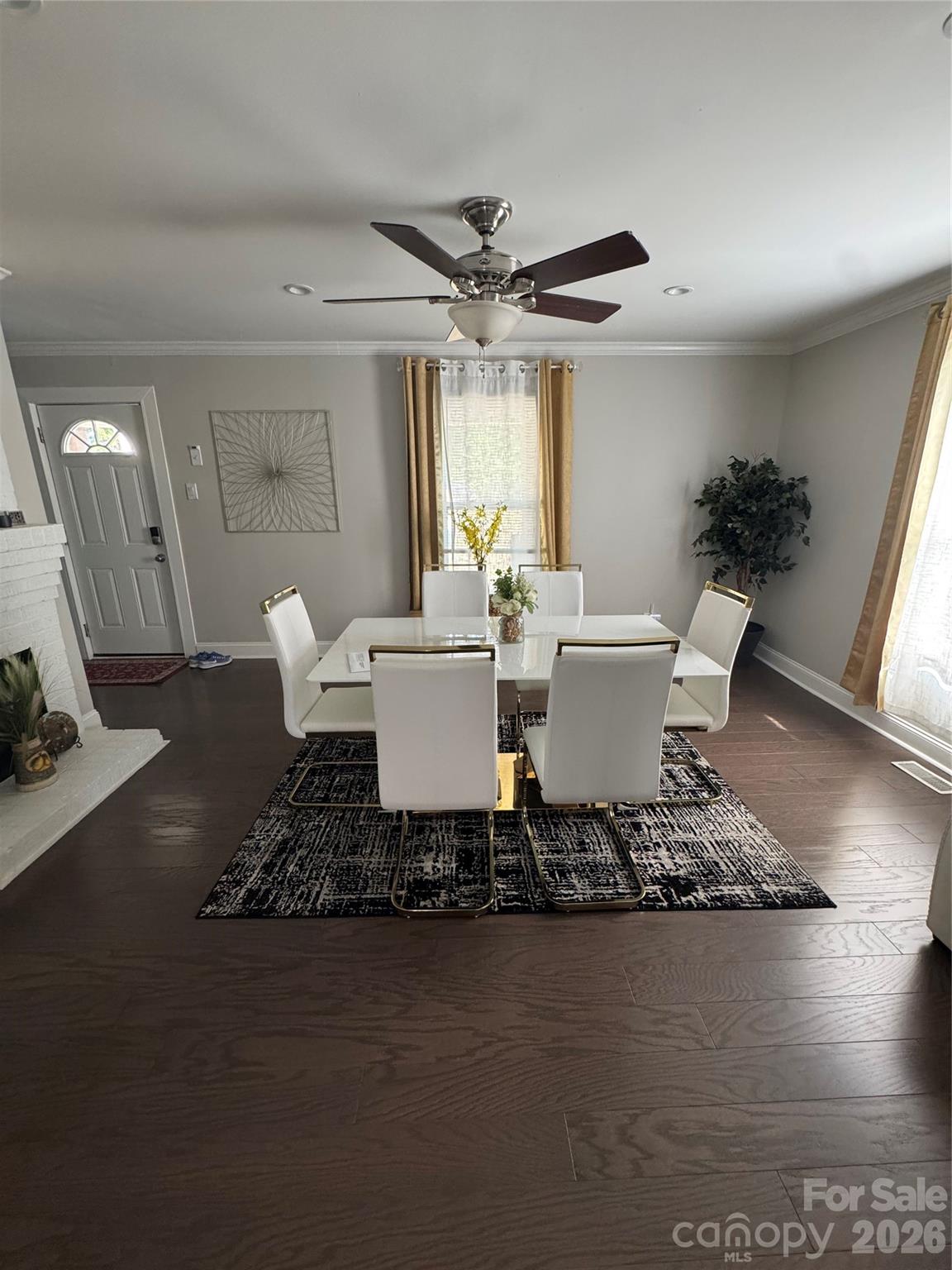 1319 Rollings Roost Road Lancaster, SC 29720 - Photo 6 of 29 a living room with a table chairs and a dining table