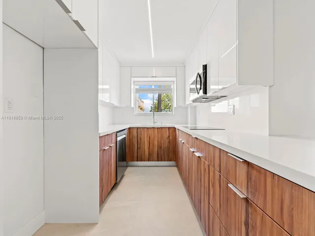 a bathroom with sink and mirror