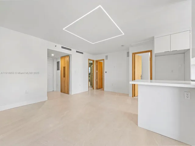 a view of an empty room with window