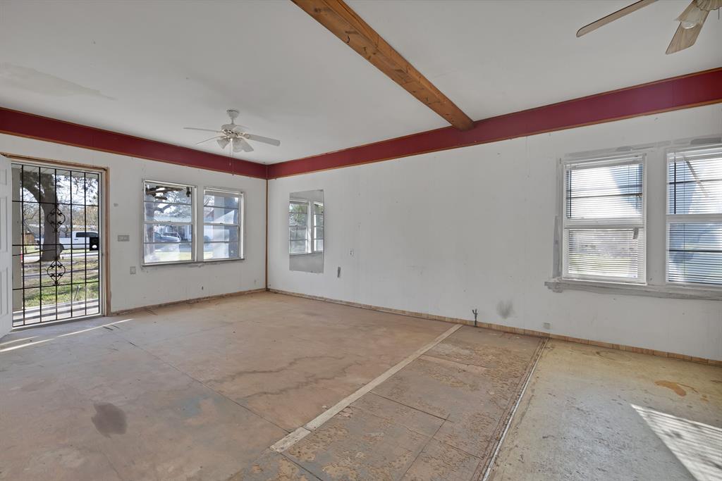 202 Johns Road Chico, TX 76431 - Photo 18 of 33 a view of an empty room with windows