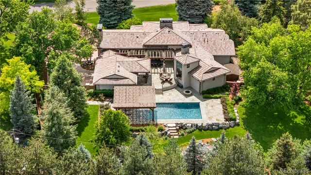 an aerial view of a house with a garden