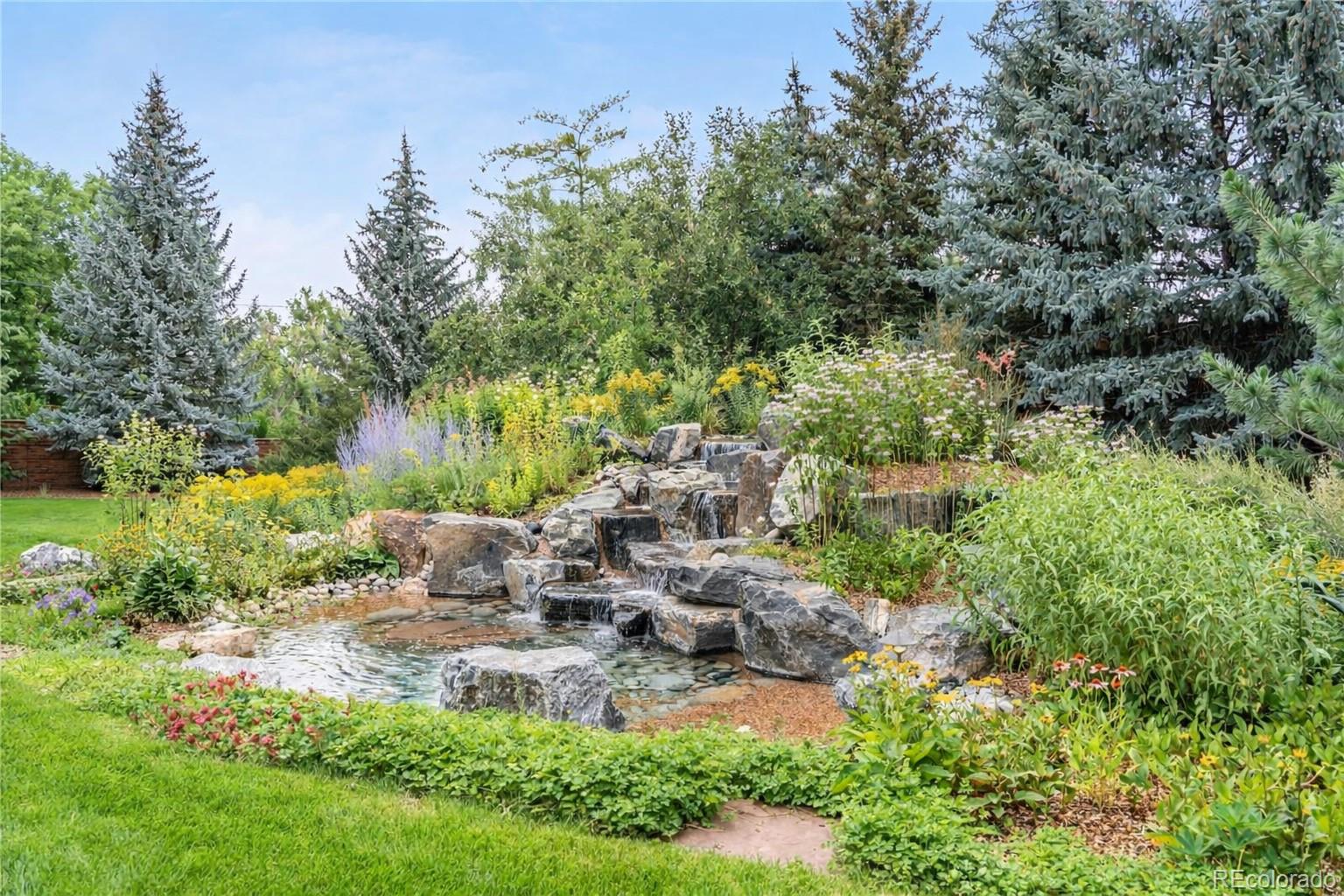 2305 Cherryville Road Greenwood Village, CO 80121 - Photo 40 of 50 a garden with lots of trees and plants