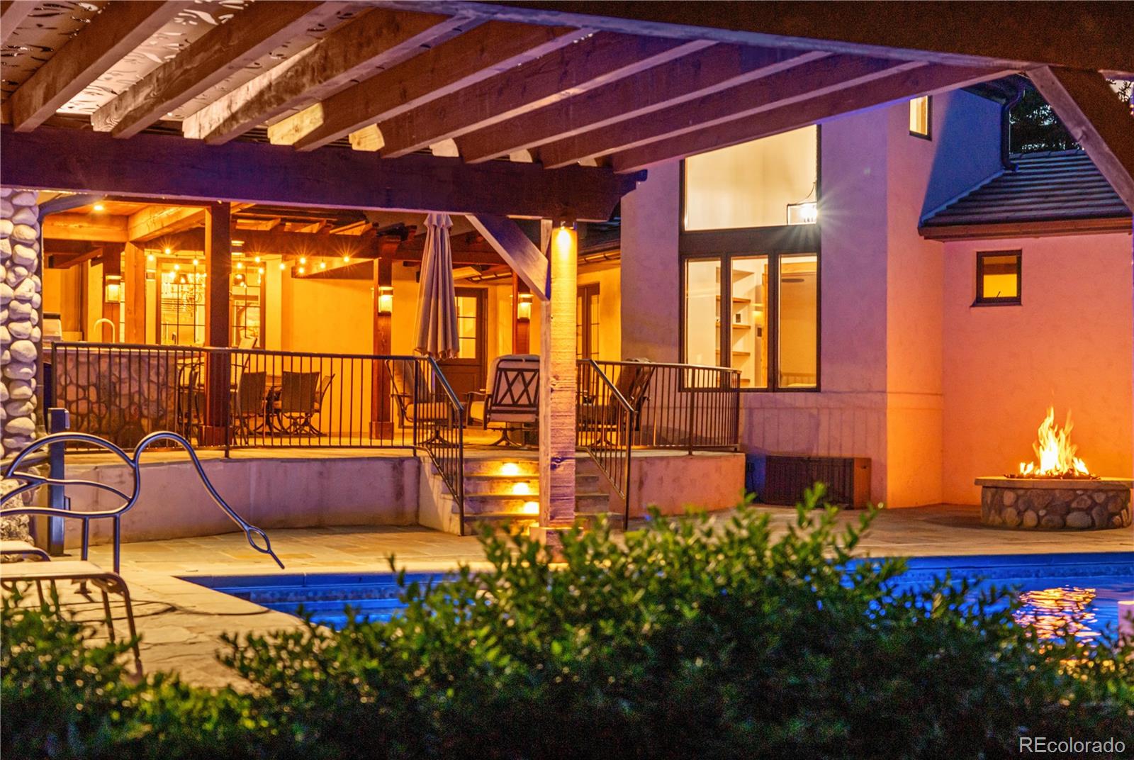 2305 Cherryville Road Greenwood Village, CO 80121 - Photo 46 of 50 a swimming pool with outdoor seating
