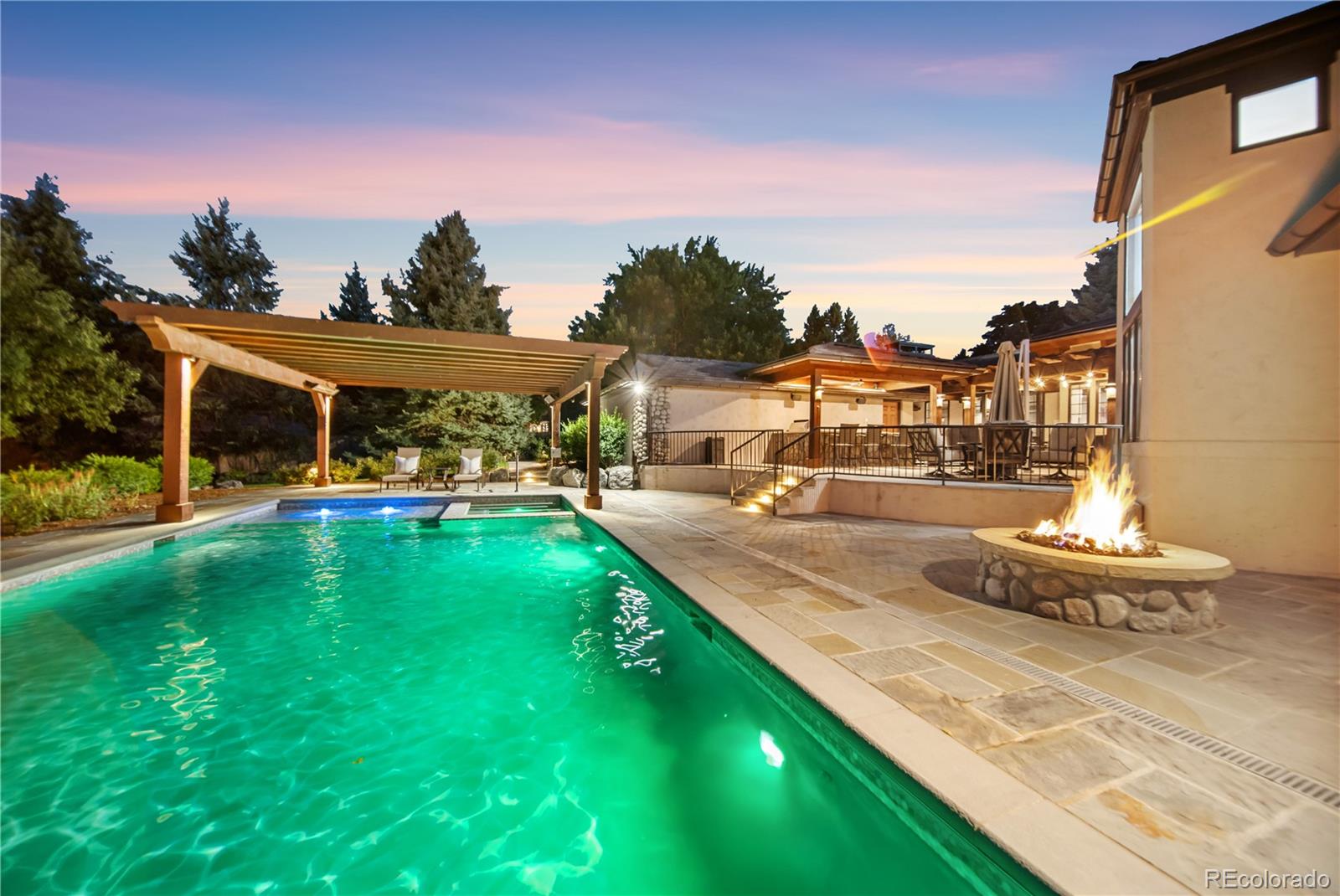 2305 Cherryville Road Greenwood Village, CO 80121 - Photo 48 of 50 a swimming pool with outdoor seating and yard