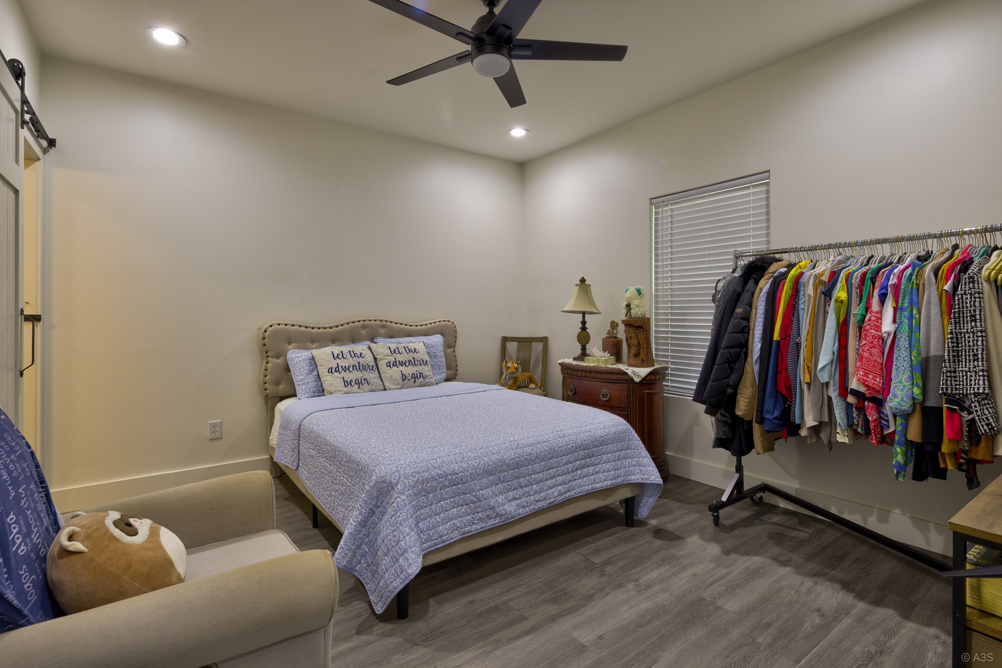 135 Wilbarger Bend Road Bastrop, TX 78602 - Photo 11 of 39 a bedroom with a bed and a couch