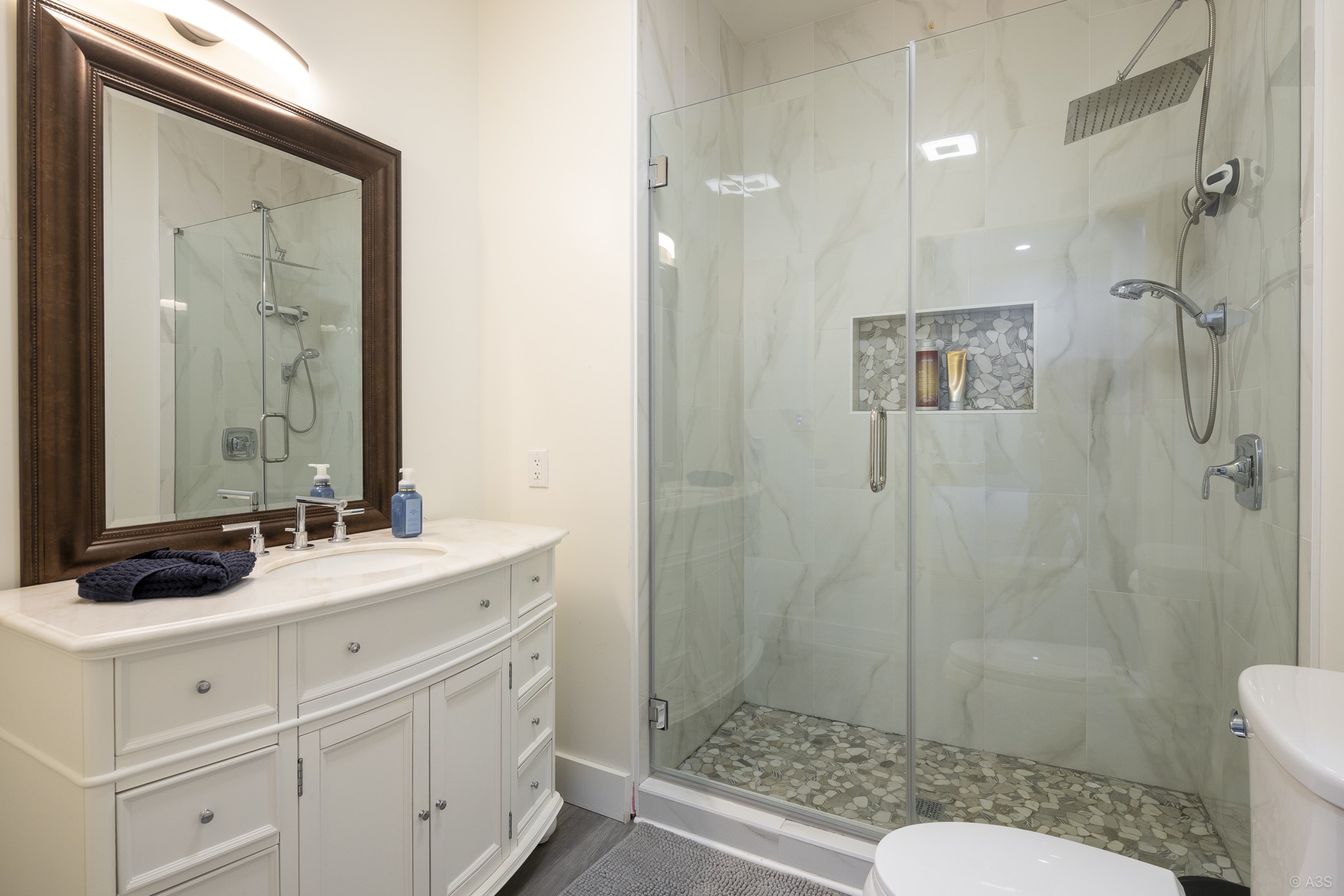 135 Wilbarger Bend Road Bastrop, TX 78602 - Photo 12 of 39 a bathroom with a sink a toilet and shower