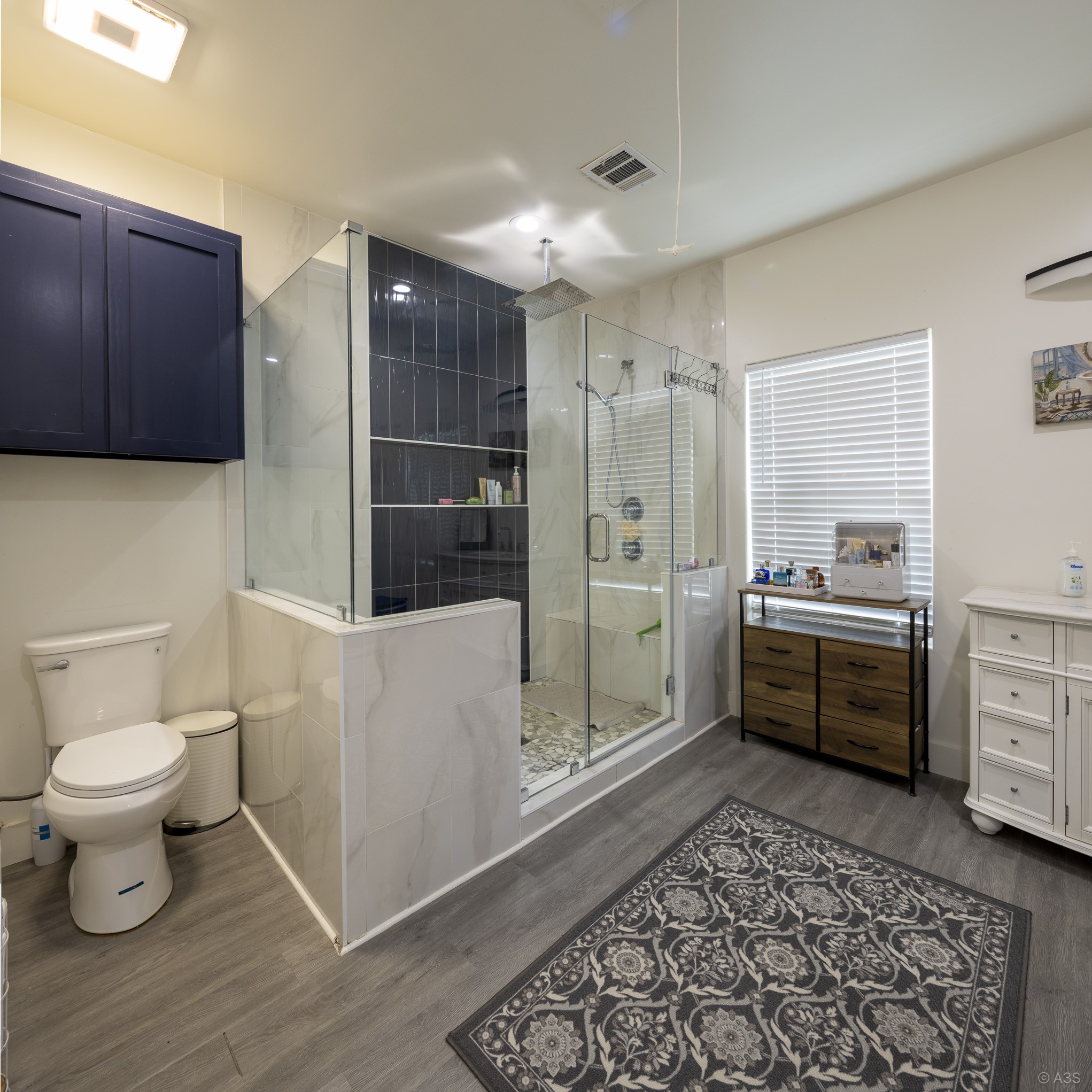 135 Wilbarger Bend Road Bastrop, TX 78602 - Photo 15 of 39 a bathroom with a sink toilet and shower