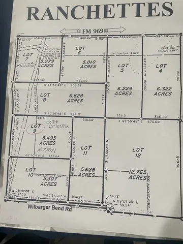 a car parked in front of house with a yard