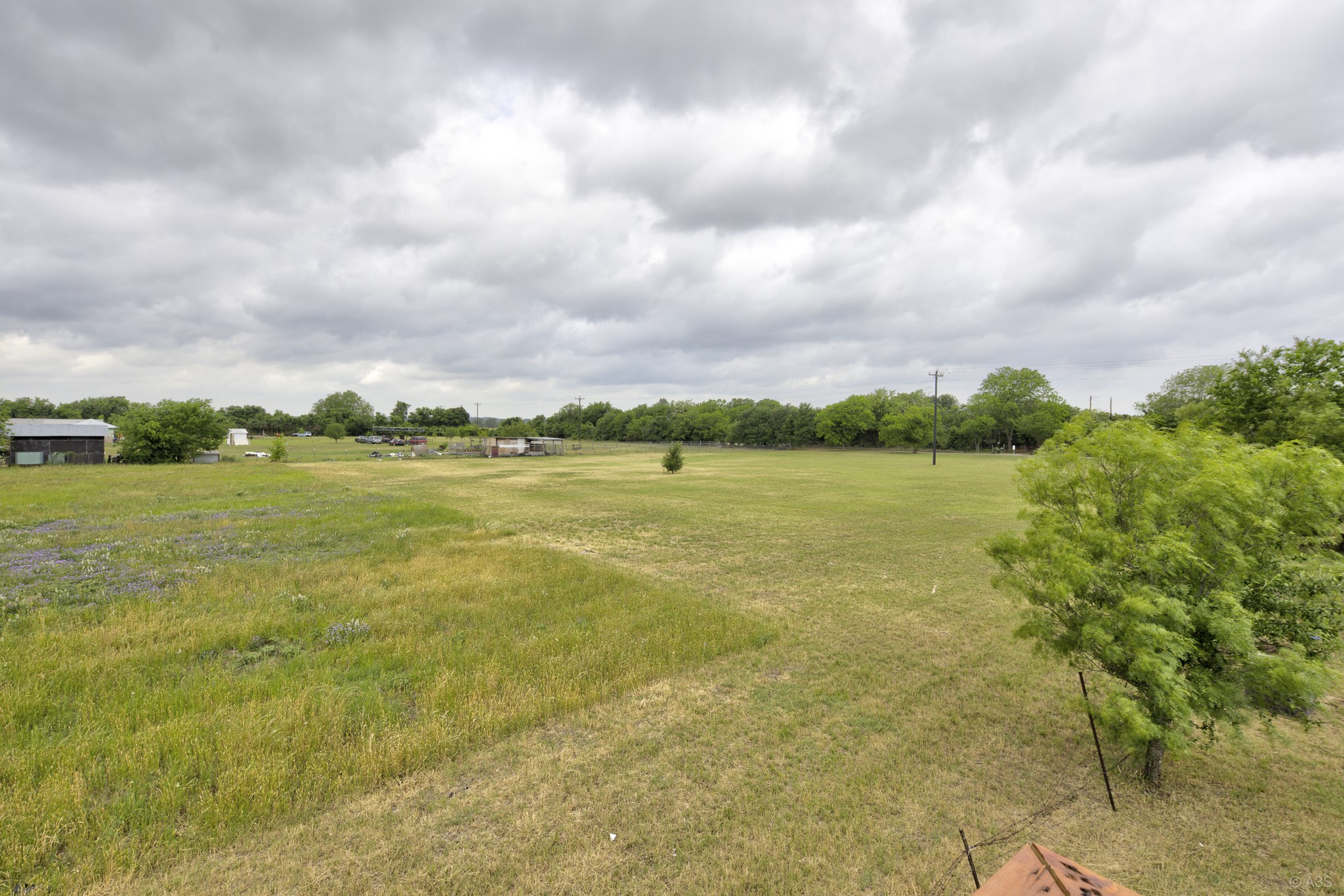 135 Wilbarger Bend Road Bastrop, TX 78602 - Photo 31 of 39 a view of a lake with a big yard