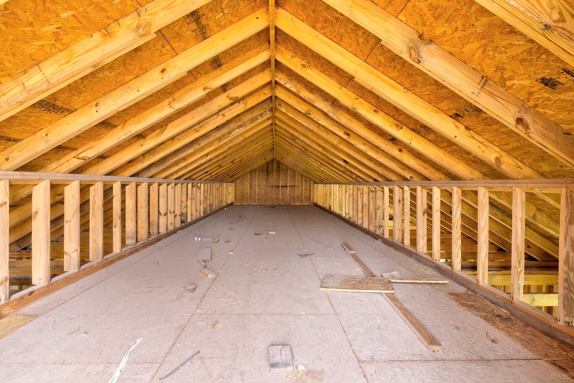 135 Wilbarger Bend Road Bastrop, TX 78602 - Photo 34 of 37 View of unfinished attic
