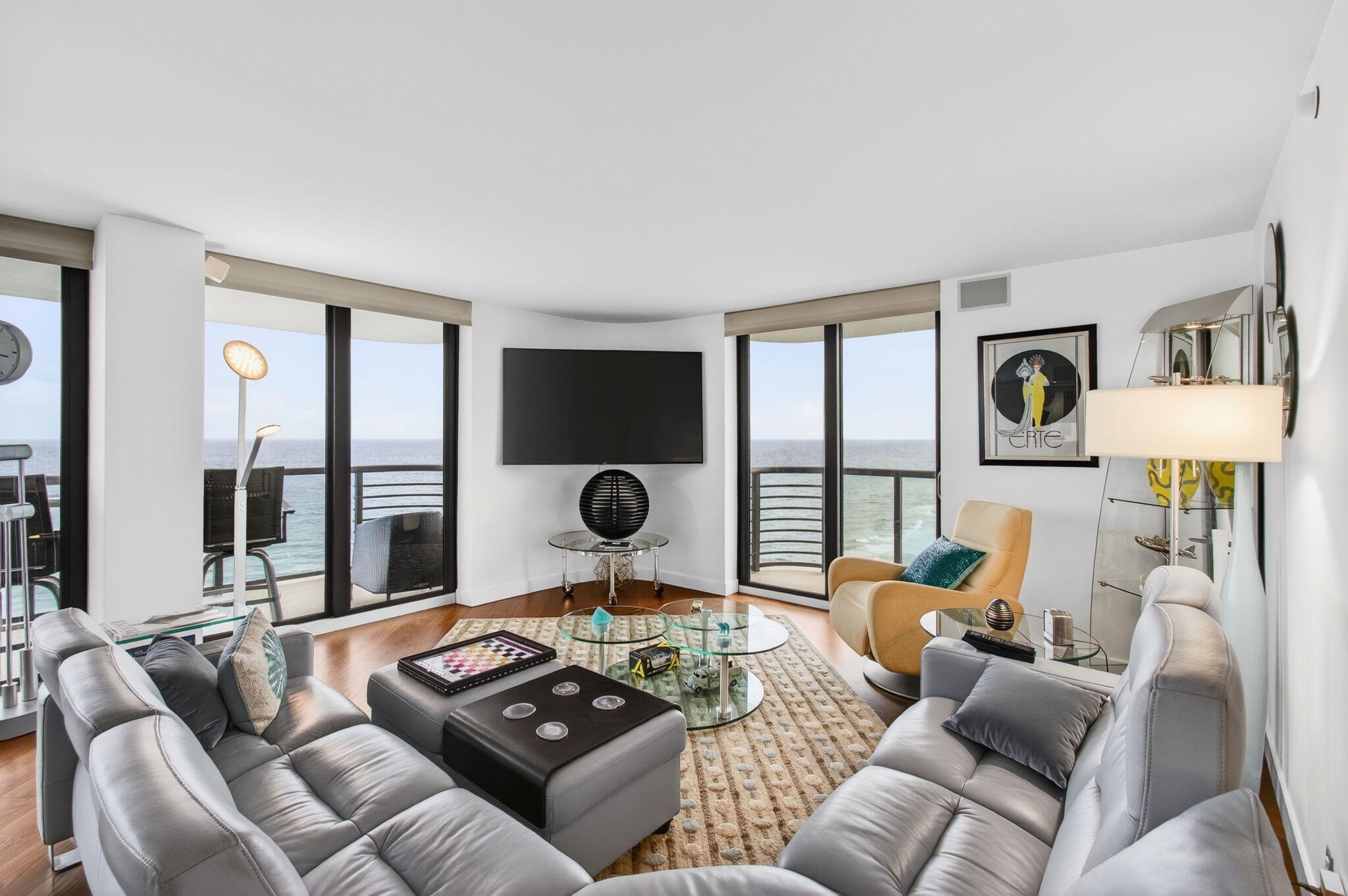 250 South Ocean Boulevard, Unit LPHA Boca Raton, FL 33432 - Photo 2 of 108 a living room with furniture and a floor to ceiling window