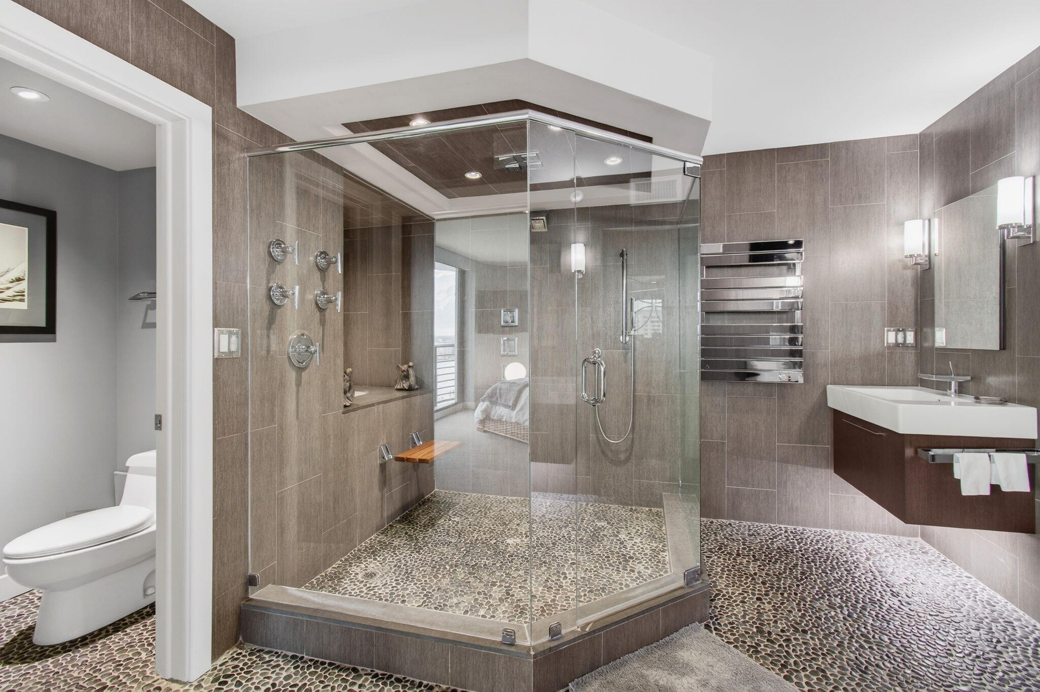 250 South Ocean Boulevard, Unit LPHA Boca Raton, FL 33432 - Photo 29 of 108 a bathroom with a sink a toilet and shower