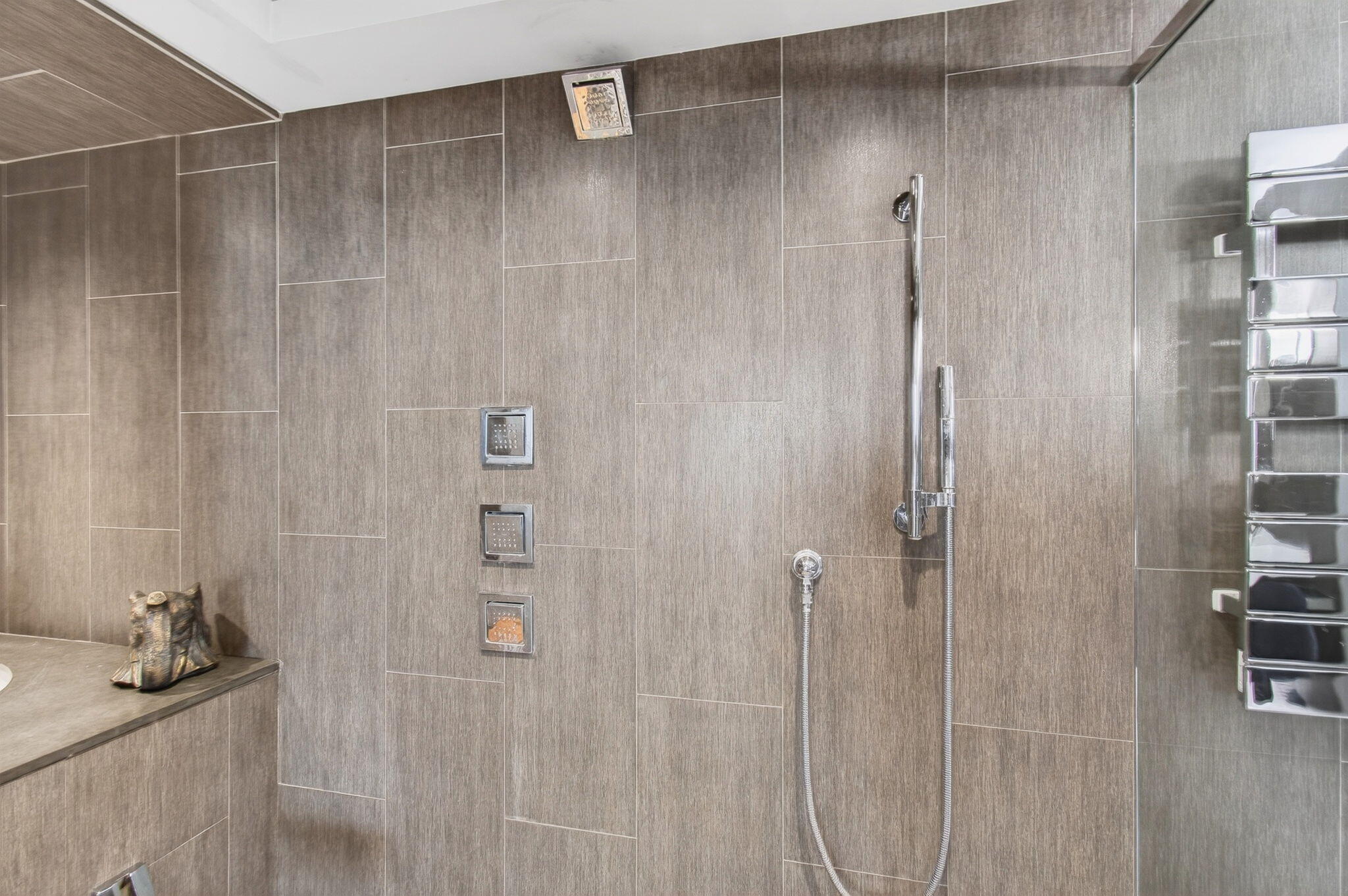 250 South Ocean Boulevard, Unit LPHA Boca Raton, FL 33432 - Photo 30 of 108 a bathroom with a shower and a sink