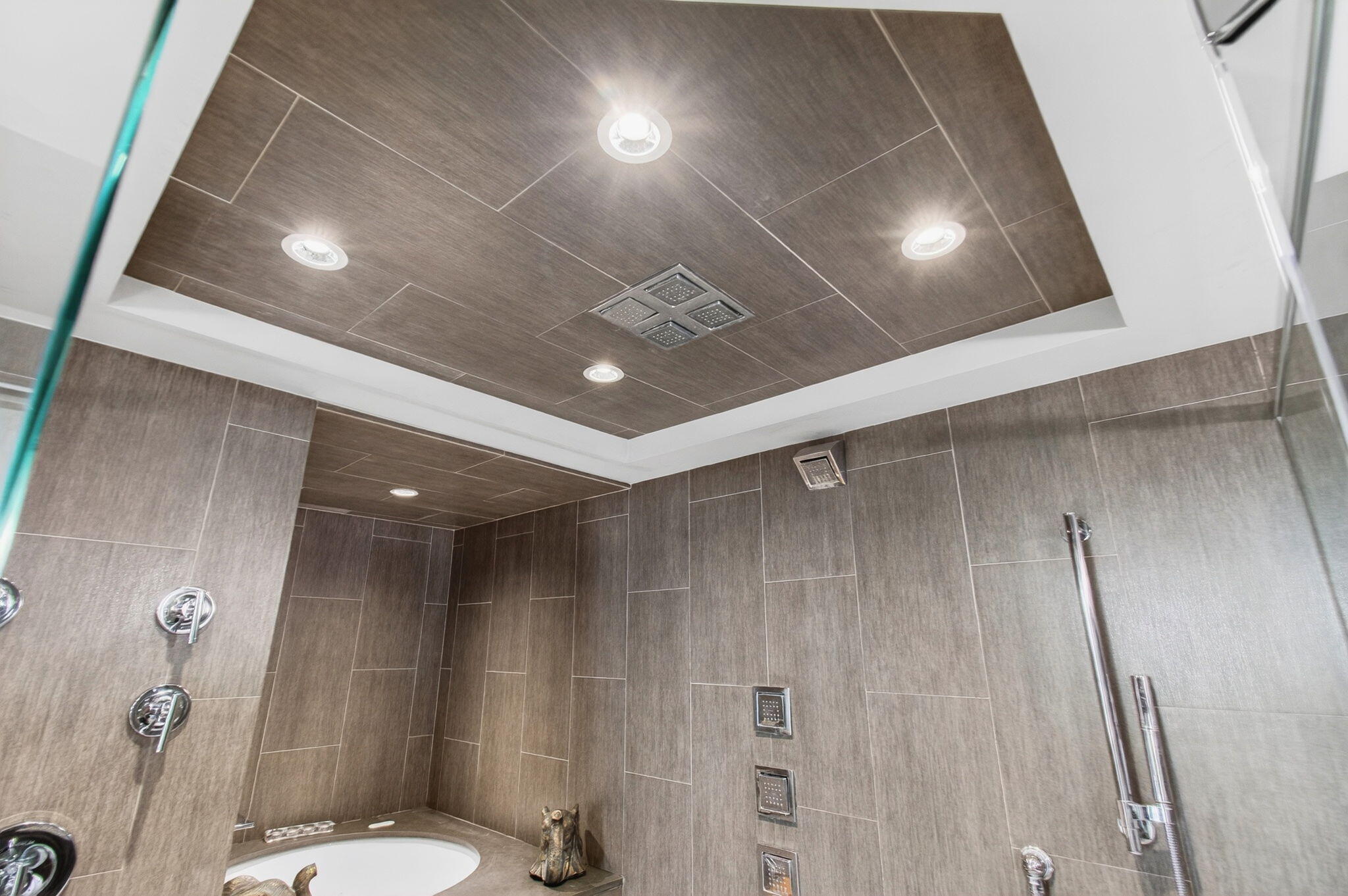 250 South Ocean Boulevard, Unit LPHA Boca Raton, FL 33432 - Photo 31 of 108 a bathroom with a toilet a sink and shower